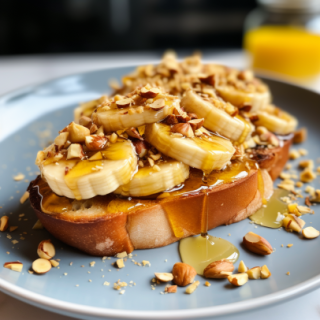 a toasted baguette topped with caramelized sliced bananas, honey and chopped nuts, professionally plated in a brightly lit kitchen