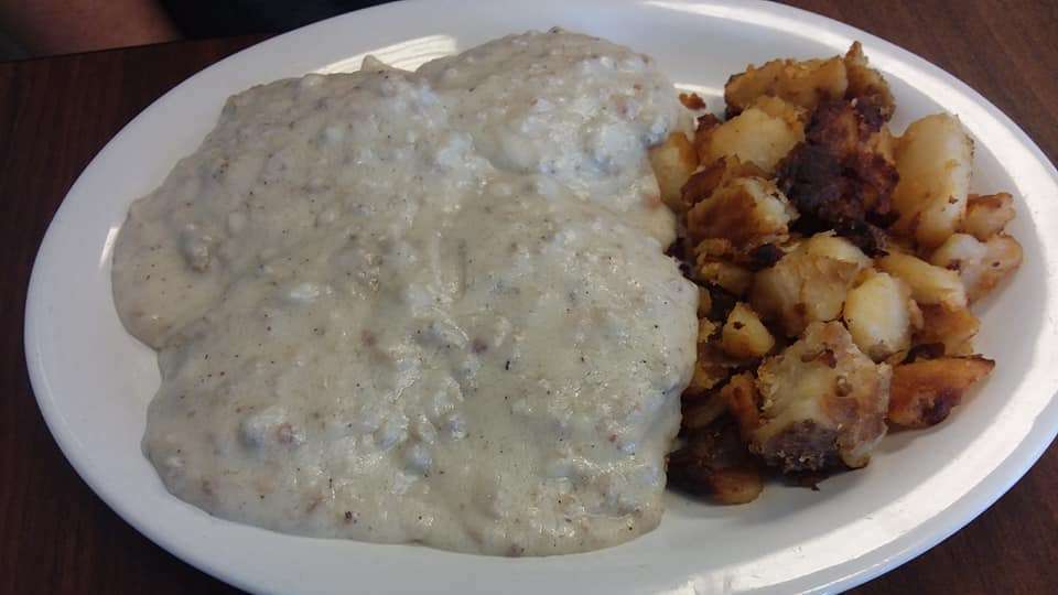 biscuits and gravy with hashbrown potatoes at flapjacks cafe
