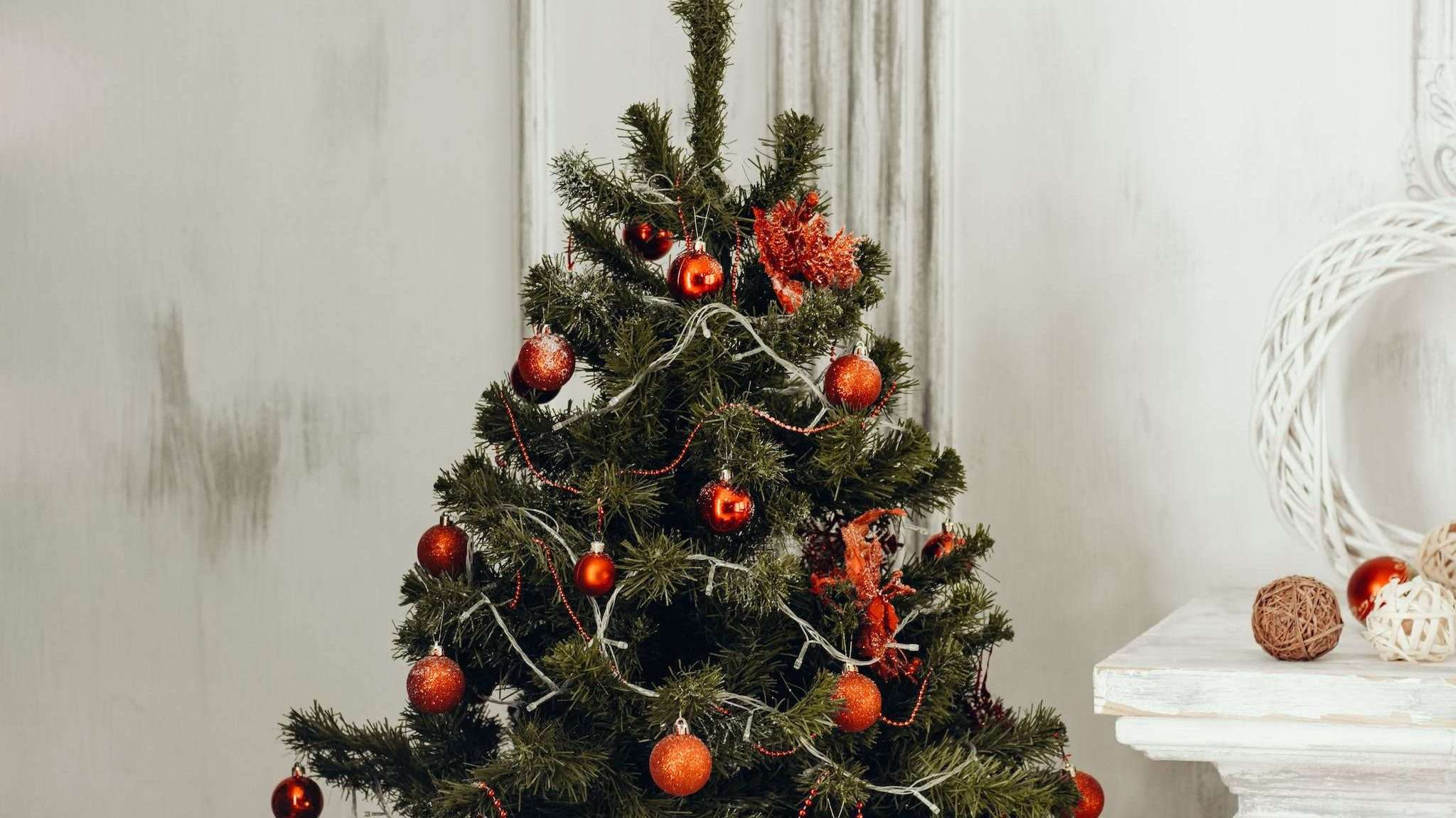 Green Christmas Tree With Orange Bauble
