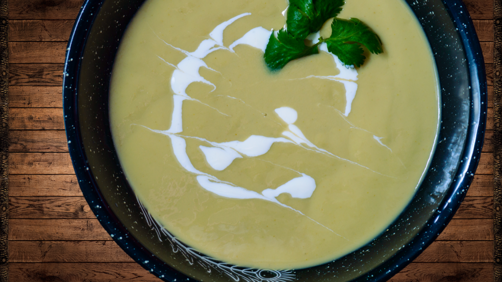 A bowl of creamy roasted poblano pepper soup