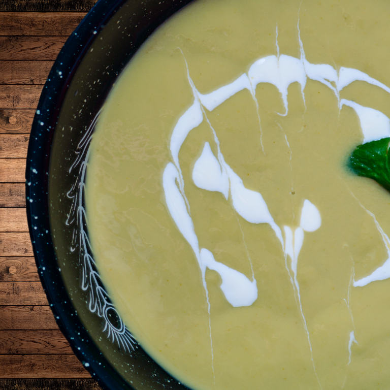 a bowl of roasted poblano pepper soup