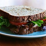 Delicious and nutritious homemade sandwich with whole wheat bread and fresh vegetables.
